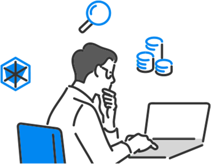 パソコンに向かって考えている人